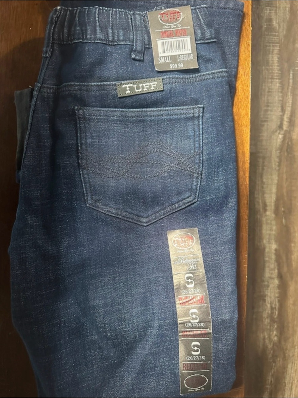 Women’s dark denim Cowgirl Tuff fleece lined jeans. Size small (26/27/28)